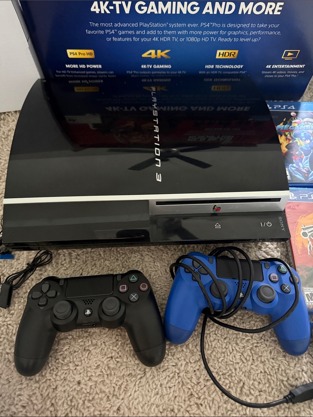 Sony PlayStation 4 Console with Black and Blue DualShock Controllers